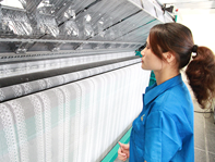 From Yarn to Luxury: The Role of Terry Warp Knitting Machine in Plush Fabric Manufacturing